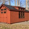 10x20 Gable Shed with Dormer, Transom Window, Transom Window Above Windows, Black Metal Roof - Board & Batten shown in Country Lane Red